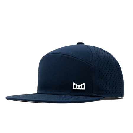 The angled view of the Melin Horizon Fit Trenches Icon Hydro hat in dark blue